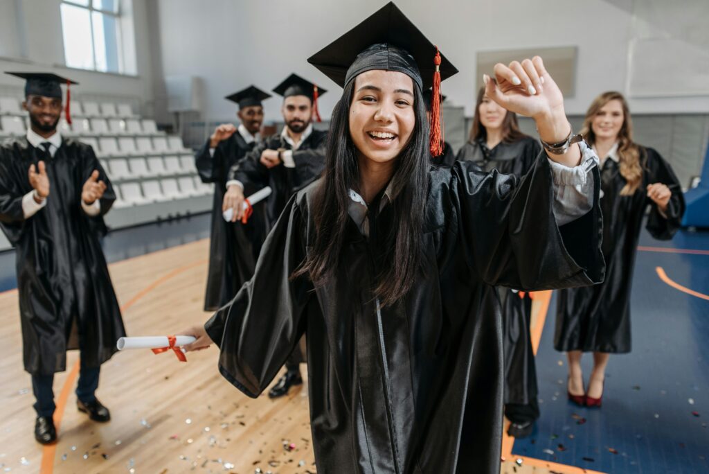 happy graduate student in europe with degree